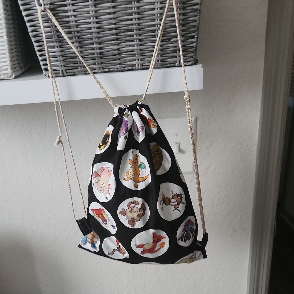 Black Drawstring Backpack with Cartoon Print